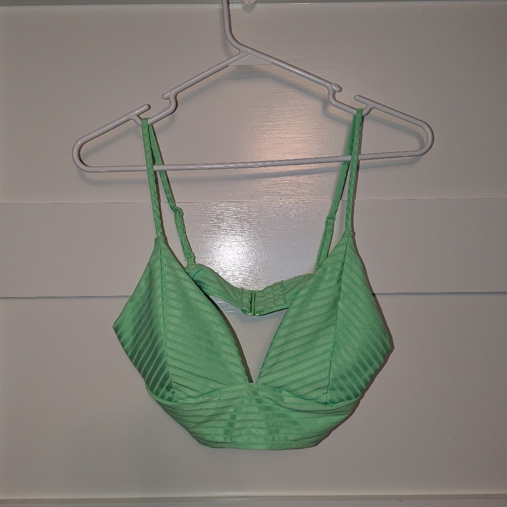 Women's juniors lime green bikini top with adjustable back and straps. Large.
